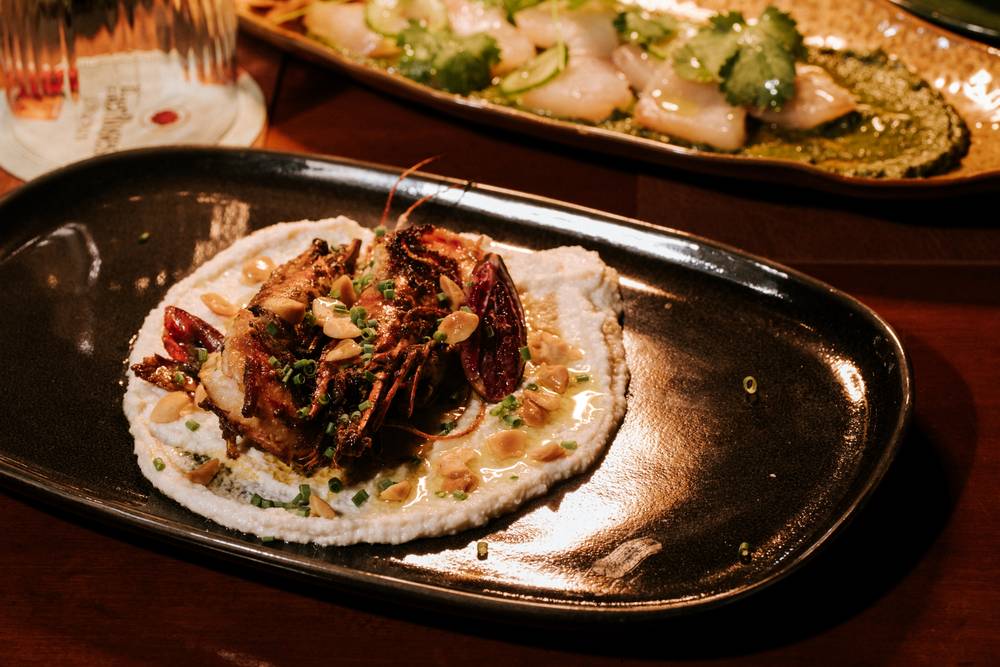 Chargrilled king prawns on macadamia ajo blanco at Aranya Acres restaurant near Canberra